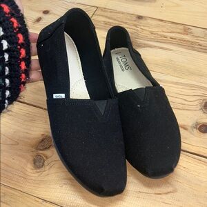 TOMS Classic Black Canvas Slip-Ons